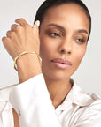Pantheon Gold Geometric Bangle Bracelet on Model 14K – Cherry Pick Diamonds St. Louis MO