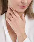 Cinque Terre 14K Yellow Gold Evil Eye Station Bracelet on Model – Cherry Pick Diamonds St. Louis MO