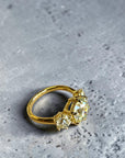 Side view of antique three stone diamond ring with Old Mine and Old European cut diamonds in 18K yellow gold, Cherry Pick Diamonds