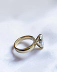 Side profile of oval brilliant lab-grown diamond ring with hidden halo band, St. Louis engagement rings