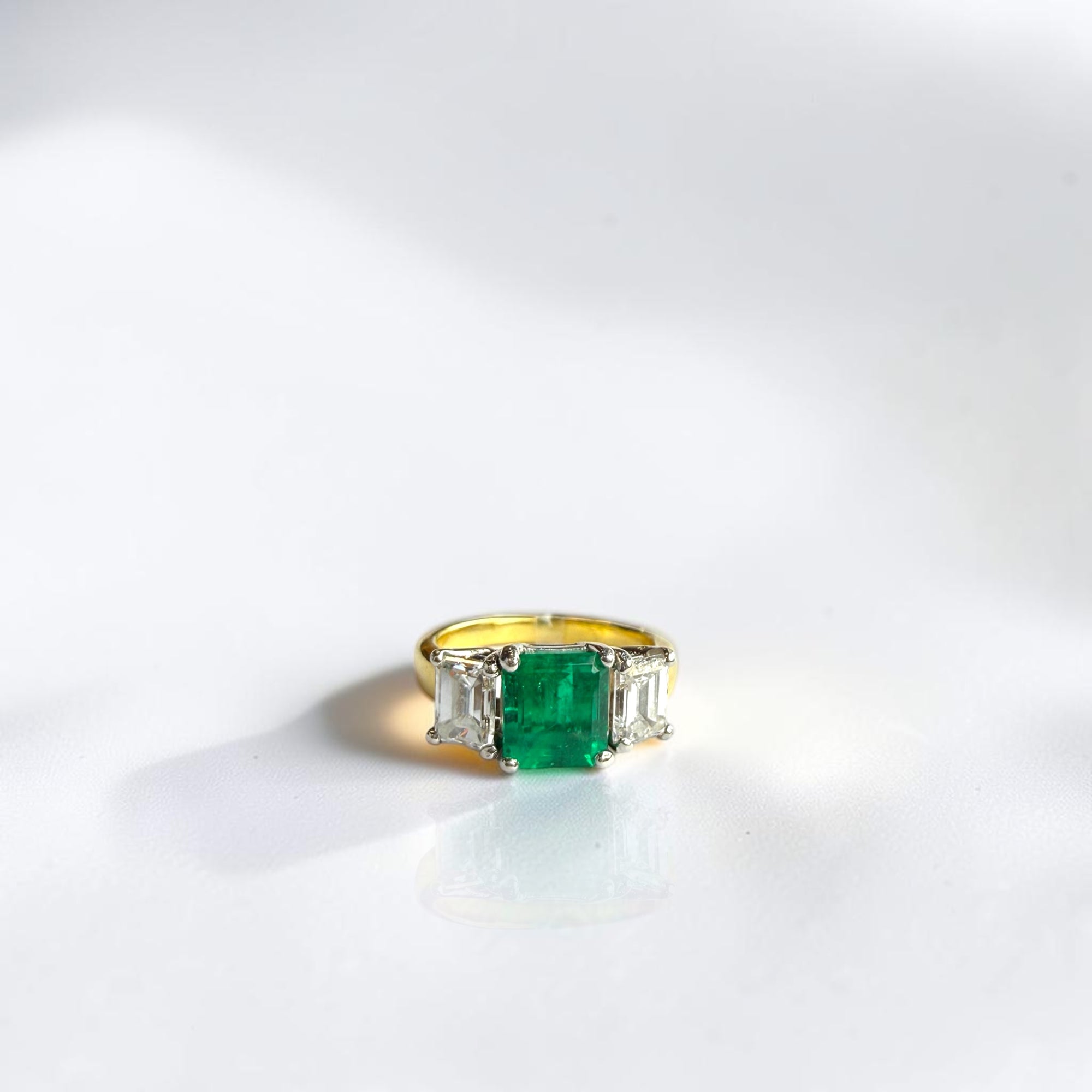 Natural green emerald trio ring with white diamonds in two-tone 18K gold – Cherry Pick Diamonds, Clayton MO