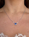1.34 carat royal blue sapphire oval diamond halo pendant necklace in 18K white gold, Cherry Pick Diamonds St. Louis