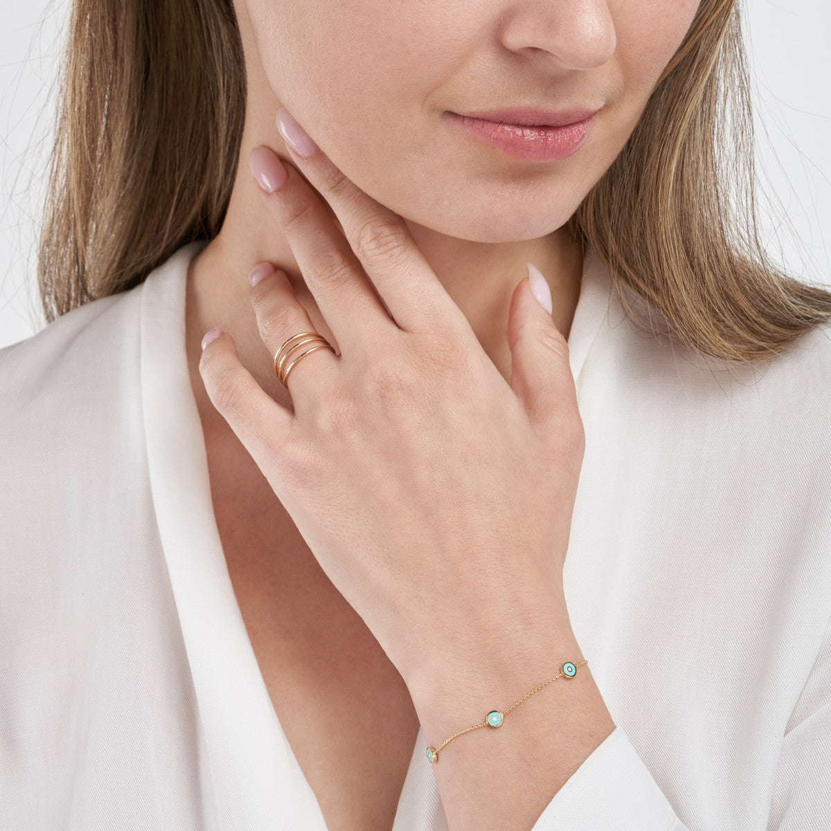 Cinque Terre 14K Yellow Gold Evil Eye Station Bracelet on Model – Cherry Pick Diamonds St. Louis MO