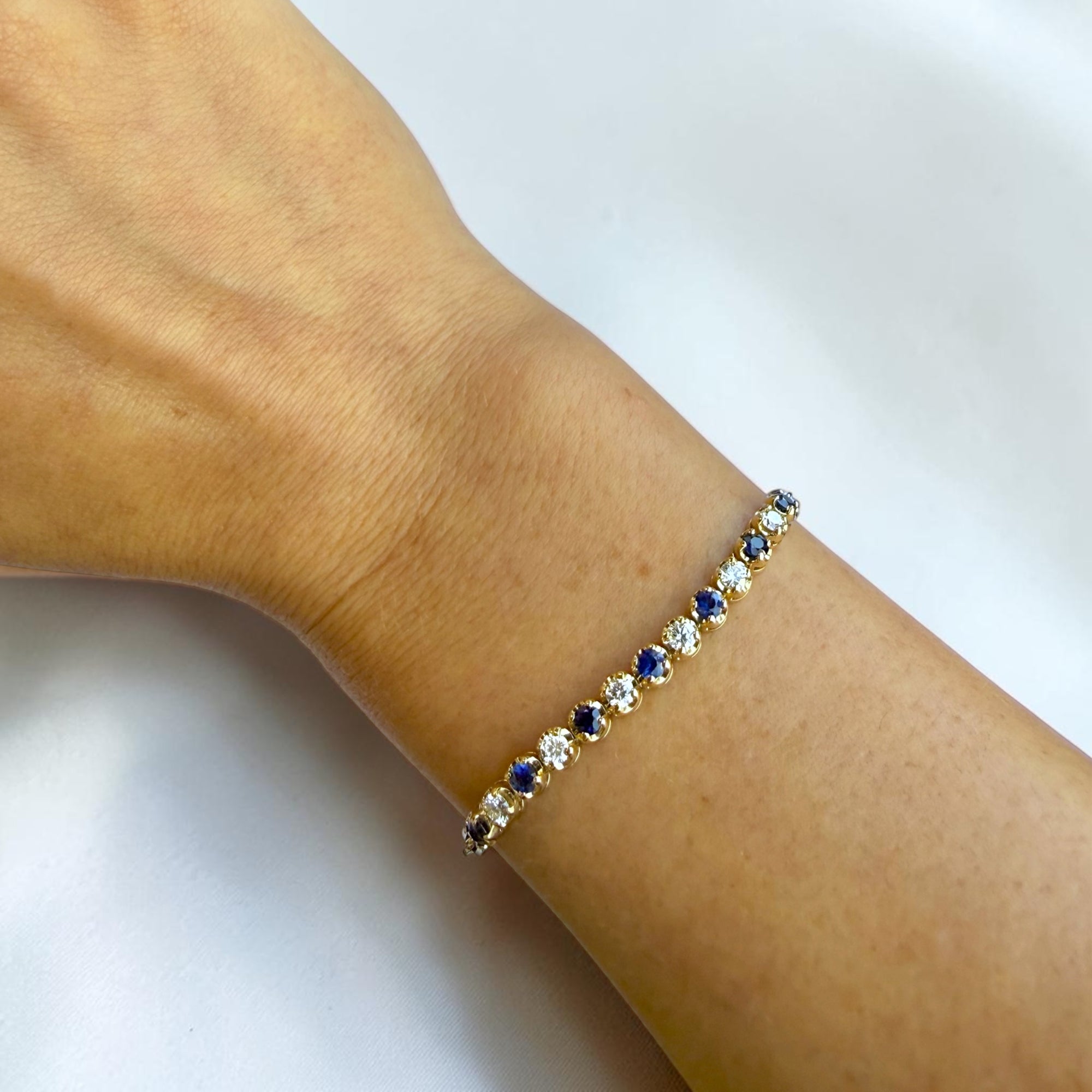 Paperclip tennis bracelet detail with sapphires and diamonds in two-tone gold - Cherry Pick Diamonds