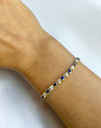 Paperclip tennis bracelet detail with sapphires and diamonds in two-tone gold - Cherry Pick Diamonds