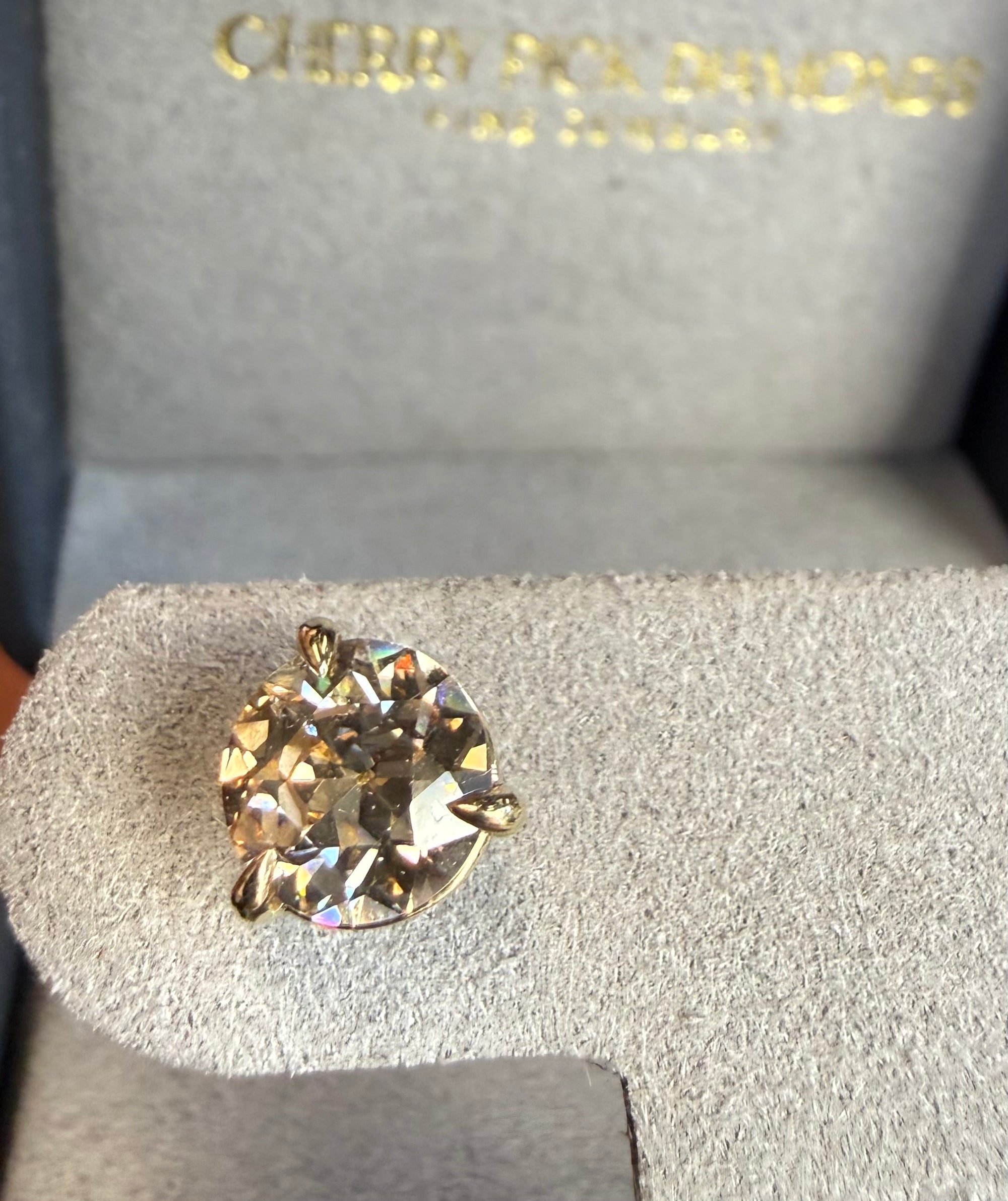 Close-up of GIA certified Champagne light brown Old European Cut diamonds, Cherry Pick Diamonds St. Louis