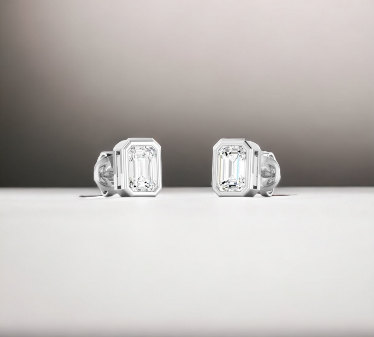 Porto EM bezel set emerald cut diamond stud earrings in 14K white gold – Cherry Pick Diamonds Clayton St. Louis MO
