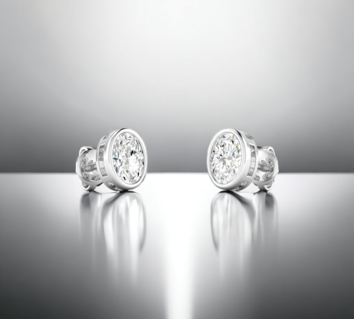 Porto OV bezel set oval cut diamond stud earrings in 14K white gold – Cherry Pick Diamonds Clayton St. Louis MO