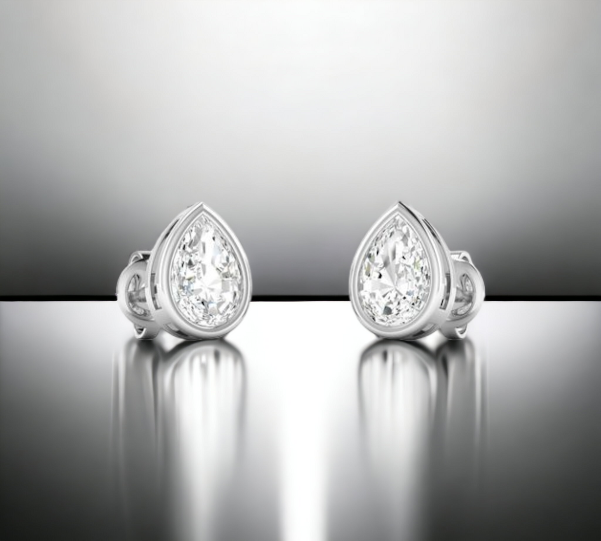 Porto PS bezel set pear shape diamond stud earrings in 14K white gold – Cherry Pick Diamonds Clayton St. Louis MO