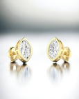 Porto MQ bezel set marquise cut diamond stud earrings in 14K yellow gold – Cherry Pick Diamonds Clayton St. Louis MO