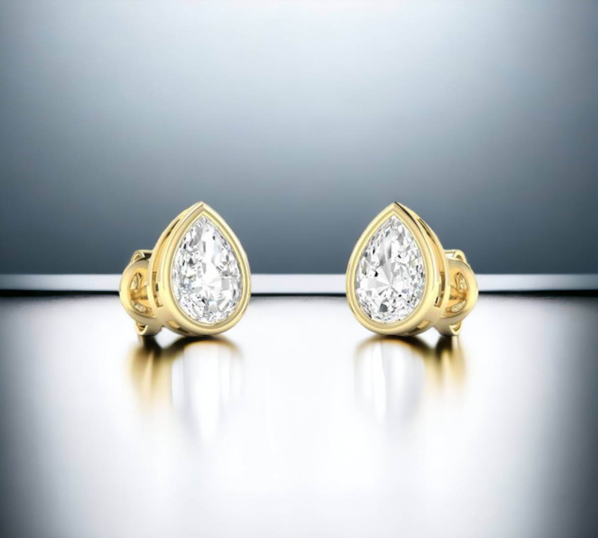 Porto PS bezel set pear shape diamond stud earrings in 14K yellow gold – Cherry Pick Diamonds Clayton St. Louis MO