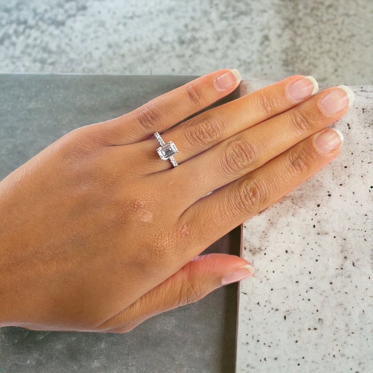 Sorrento EM ring angle view, emerald cut hidden halo white gold – Cherry Pick Diamonds St. Louis MO