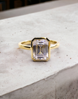 Bergamo YG engagement ring in 14K yellow gold with bezel set emerald cut lab created diamond – Cherry Pick Diamonds Clayton St. Louis MO