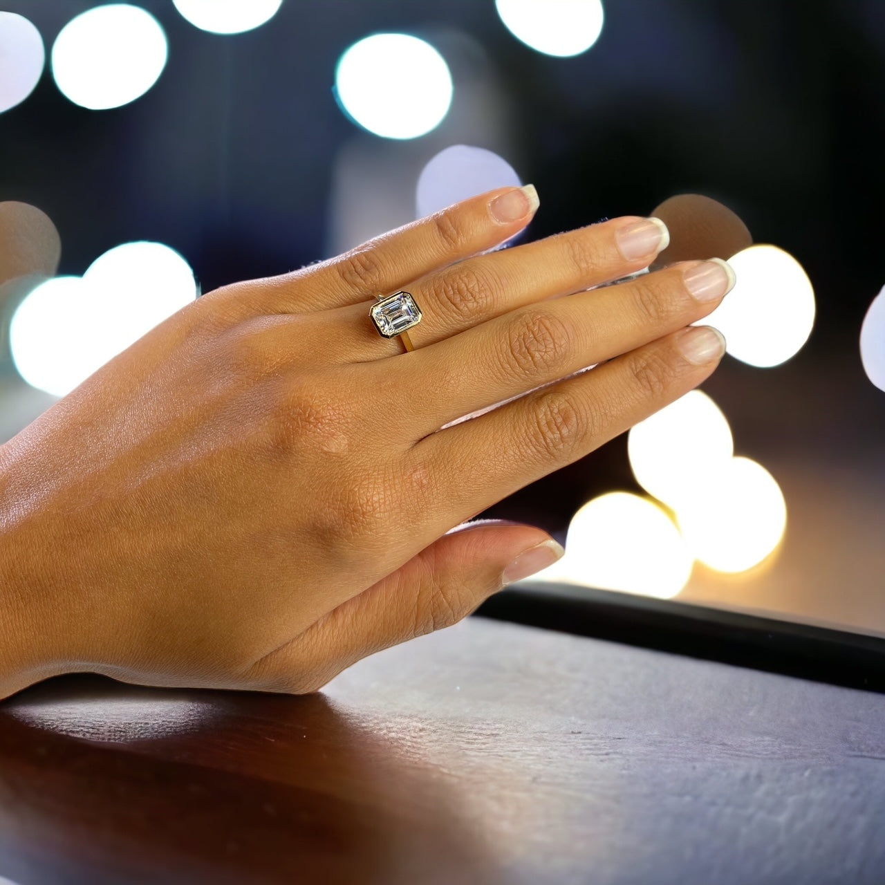 Bergamo YG engagement ring close-up, yellow gold bezel emerald cut – Cherry Pick Diamonds Clayton MO