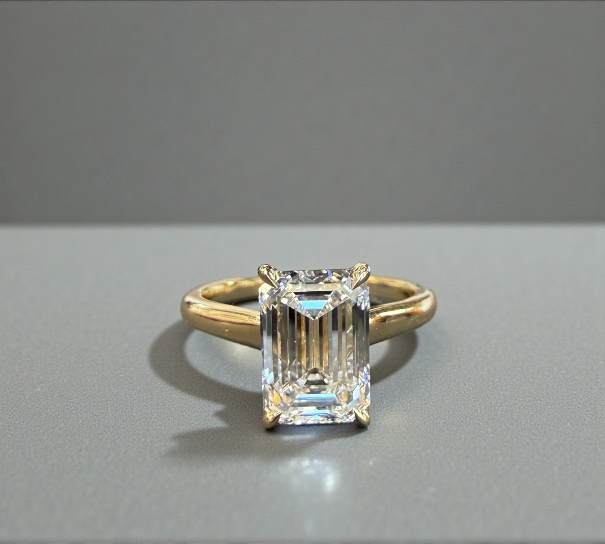 Clayton Emerald engagement ring in 14K yellow gold with 2.97ct emerald cut lab created diamond – Cherry Pick Diamonds Clayton St. Louis MO