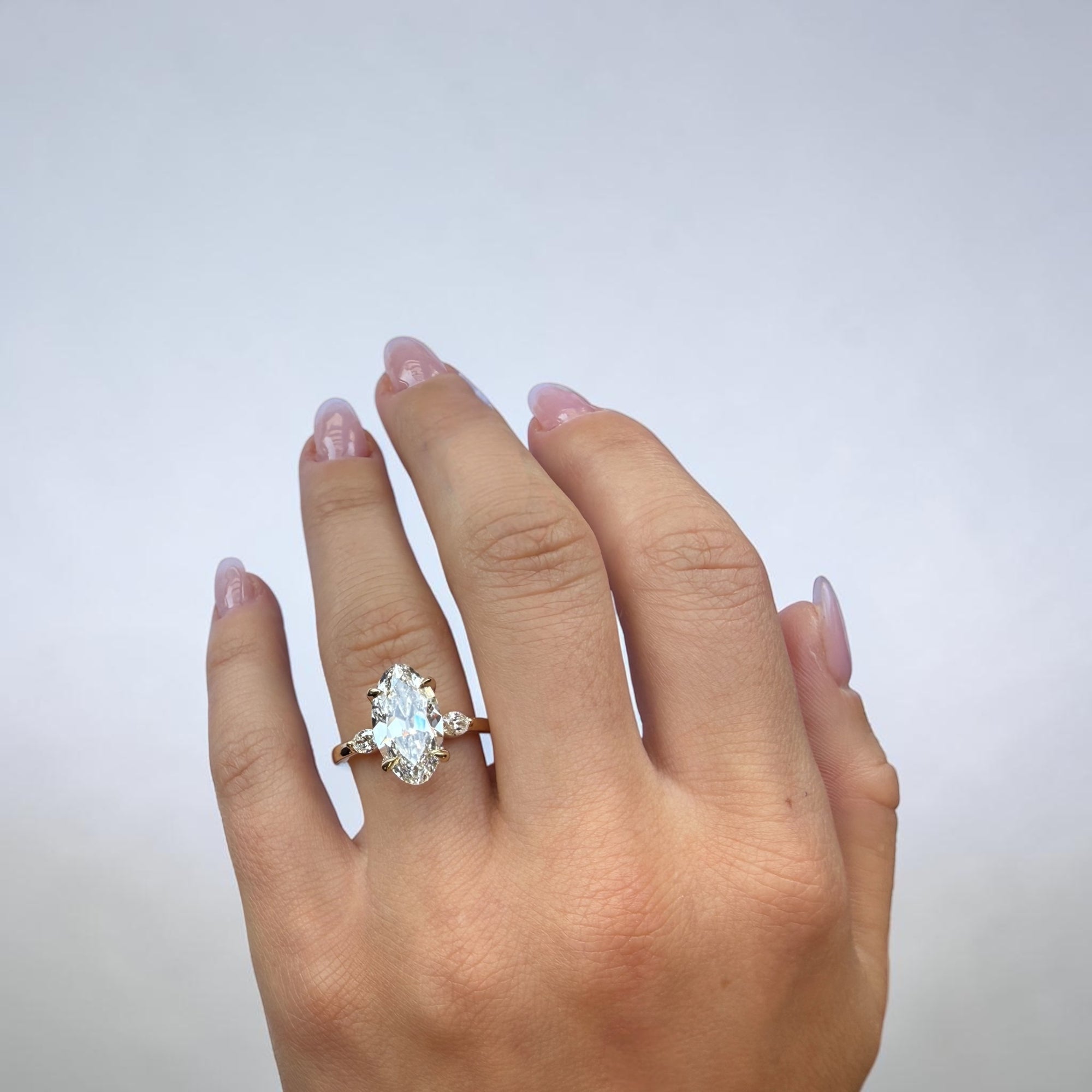 Side profile of Moval Crown ring showing elongated old mine moval center diamond — Cherry Pick Diamonds Clayton Missouri