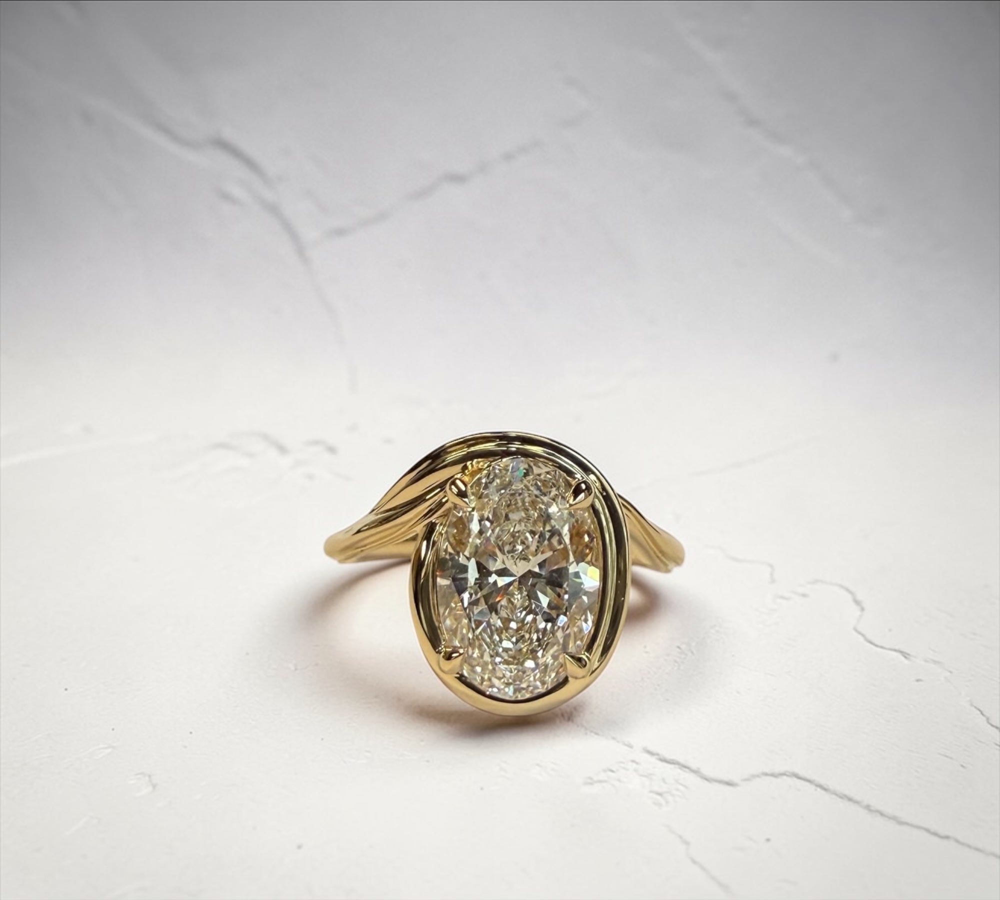 Spartan Oval engagement ring in 14K yellow gold with 3.10ct spiraling elongated oval lab created diamond – Cherry Pick Diamonds Clayton St. Louis MO