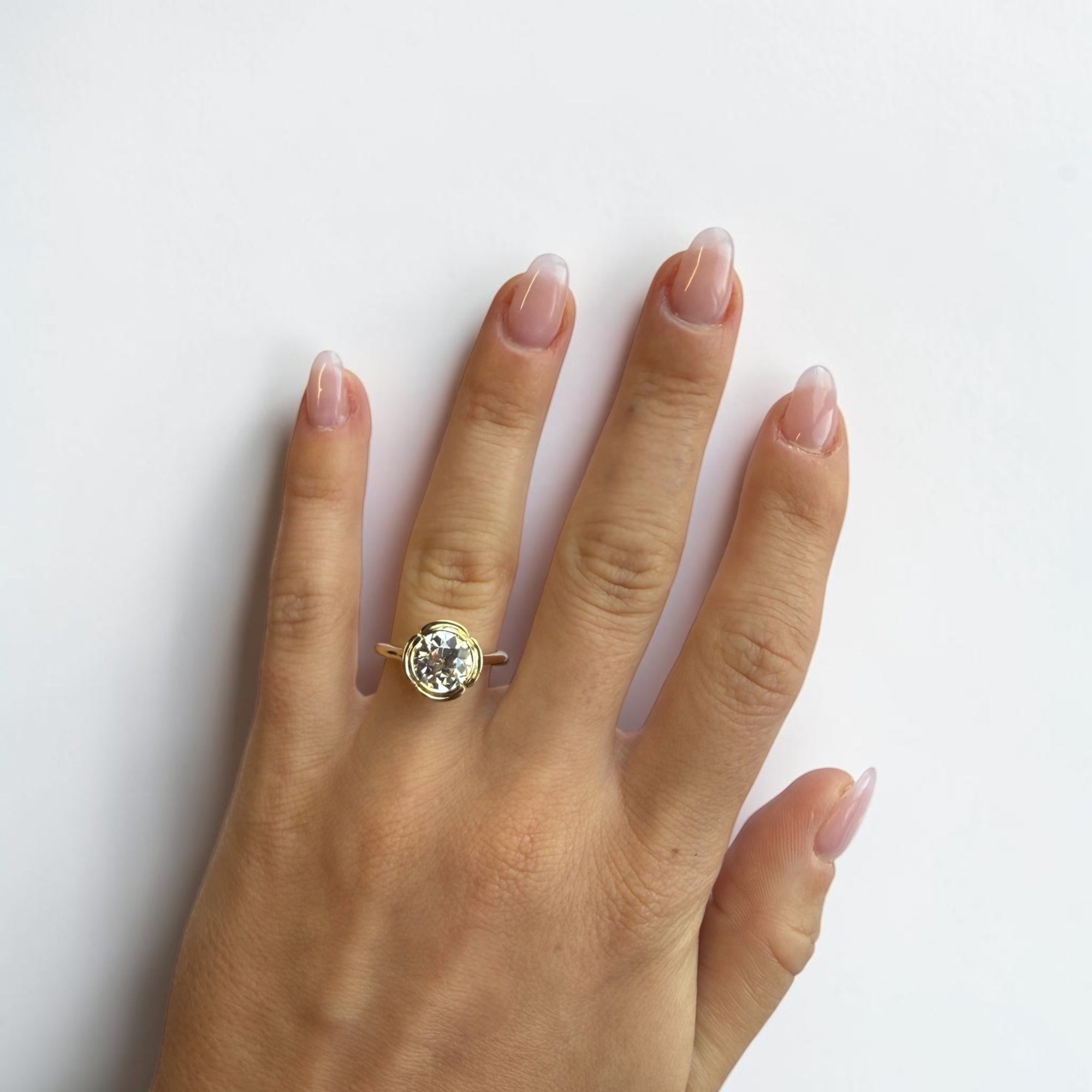 Close-up of 2.09ct Old European Cut natural GIA diamond in floral motif yellow gold ring — Cherry Pick Diamonds Clayton Missouri