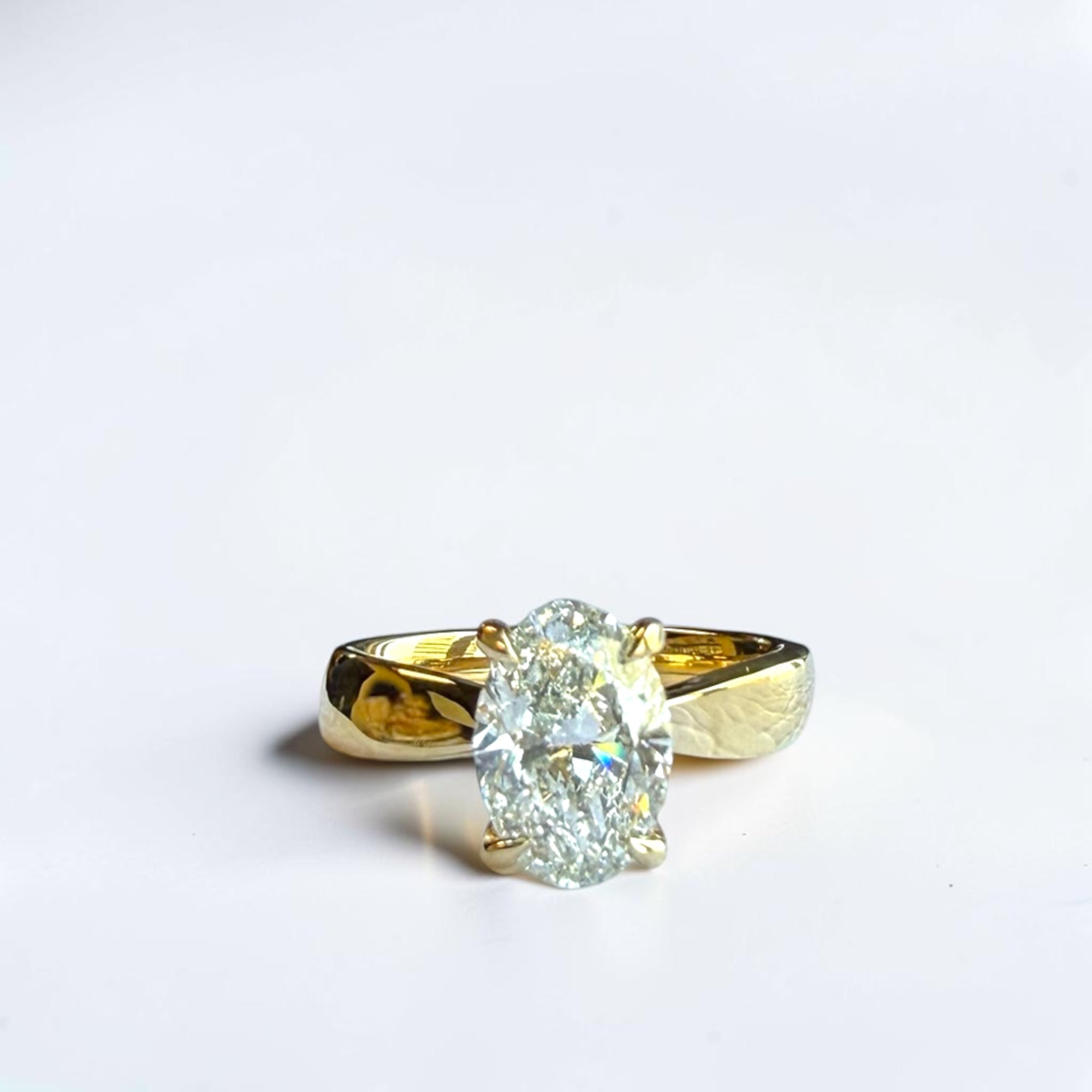 Oval Waves engagement ring in 14K yellow gold with bold wave shank and natural oval diamond – Cherry Pick Diamonds Clayton St. Louis MO