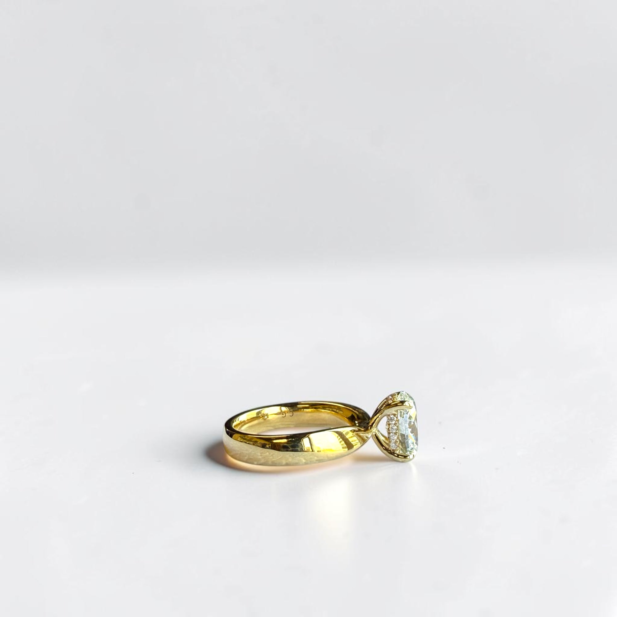 Oval Waves engagement ring side profile showing bold wave shank design — Cherry Pick Diamonds St. Louis