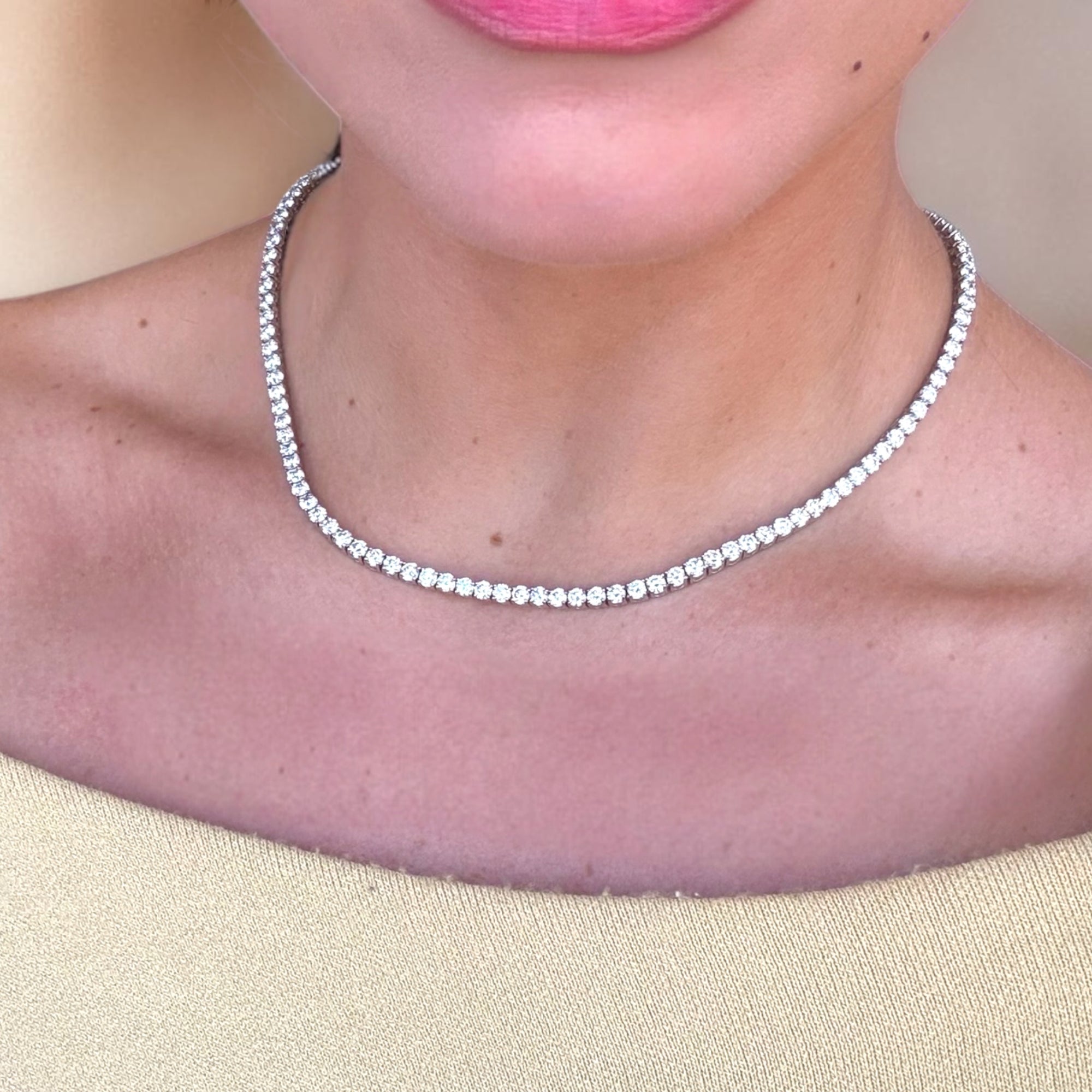 Close-up of natural diamond tennis necklace prong settings in white gold - Cherry Pick Diamonds