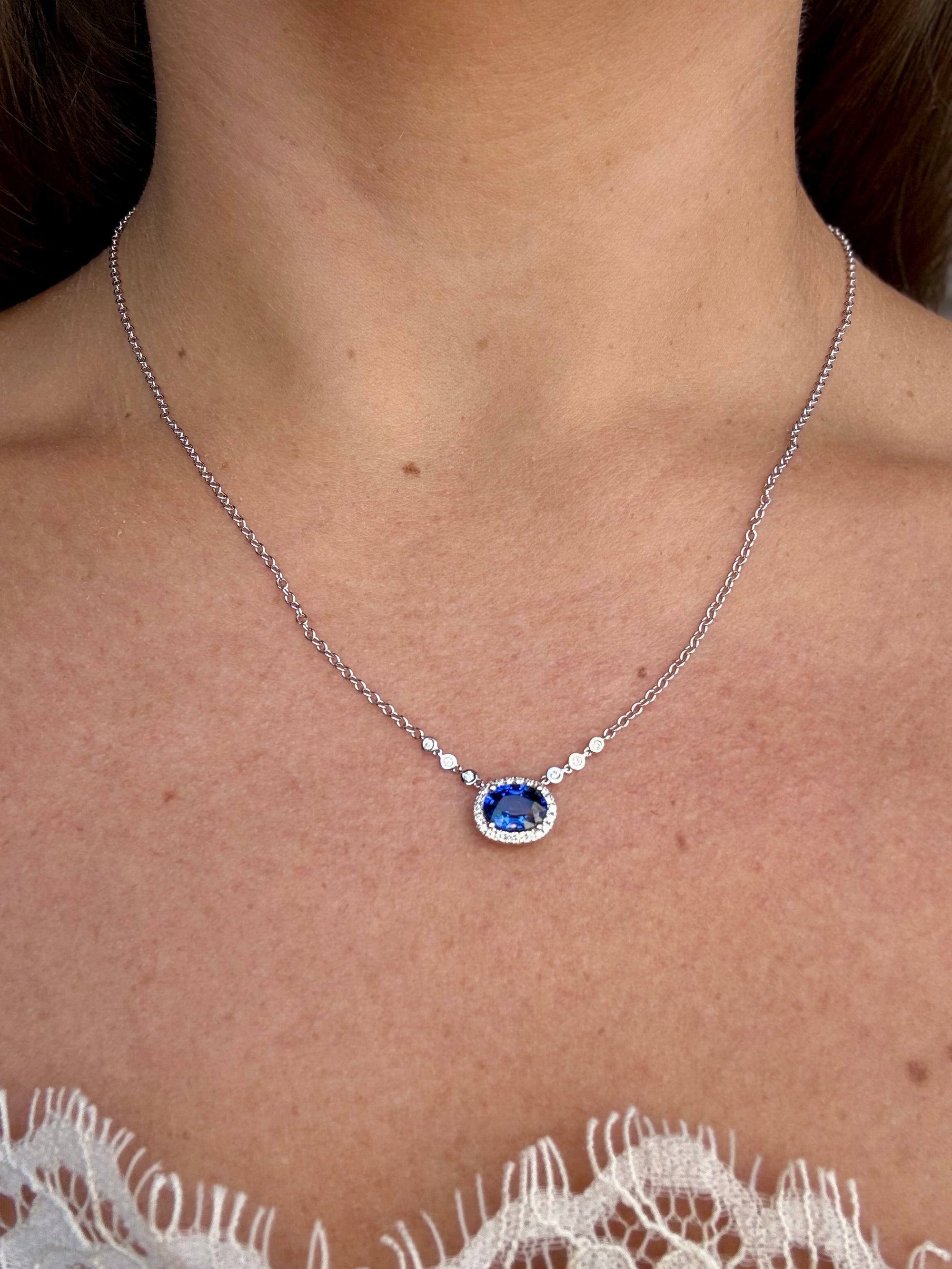1.34 carat royal blue sapphire oval diamond halo pendant necklace in 18K white gold, Cherry Pick Diamonds St. Louis