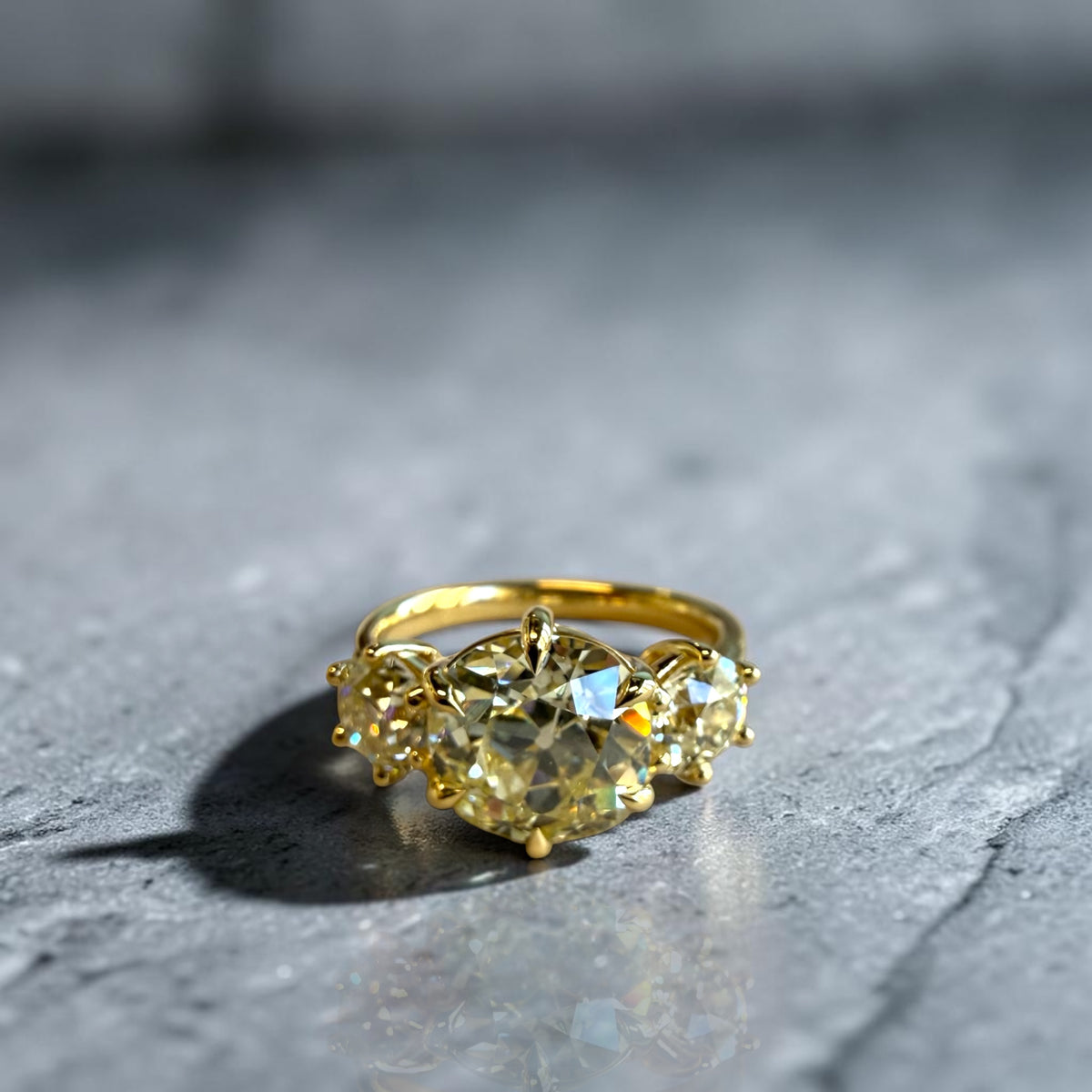 Antique Old Mine cut diamond three stone ring in 18K yellow gold, 4.23 carats total weight, Cherry Pick Diamonds Clayton MO