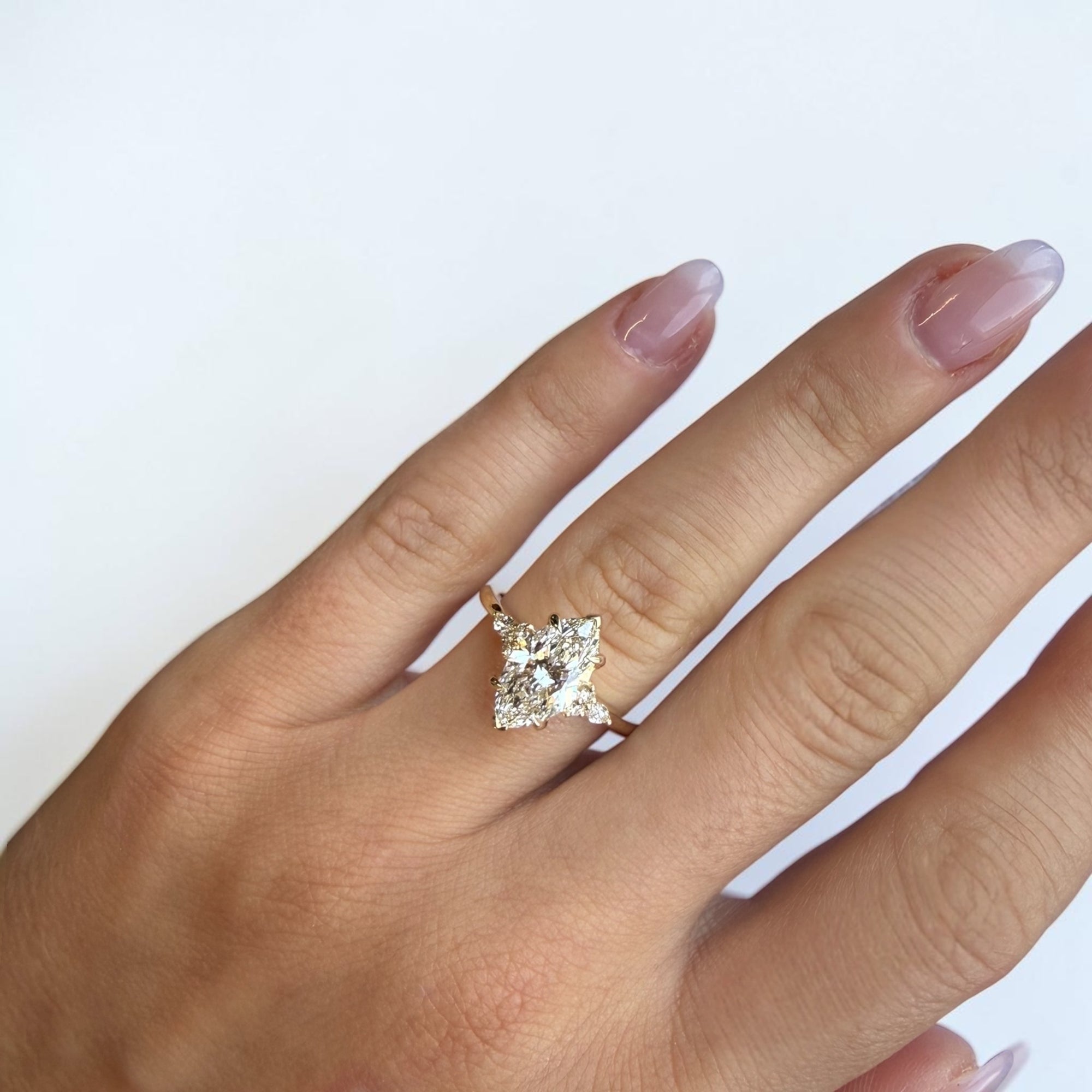 Top view of Marquise Crown ring showcasing five stone diamond setting in yellow gold — Cherry Pick Diamonds Clayton Missouri