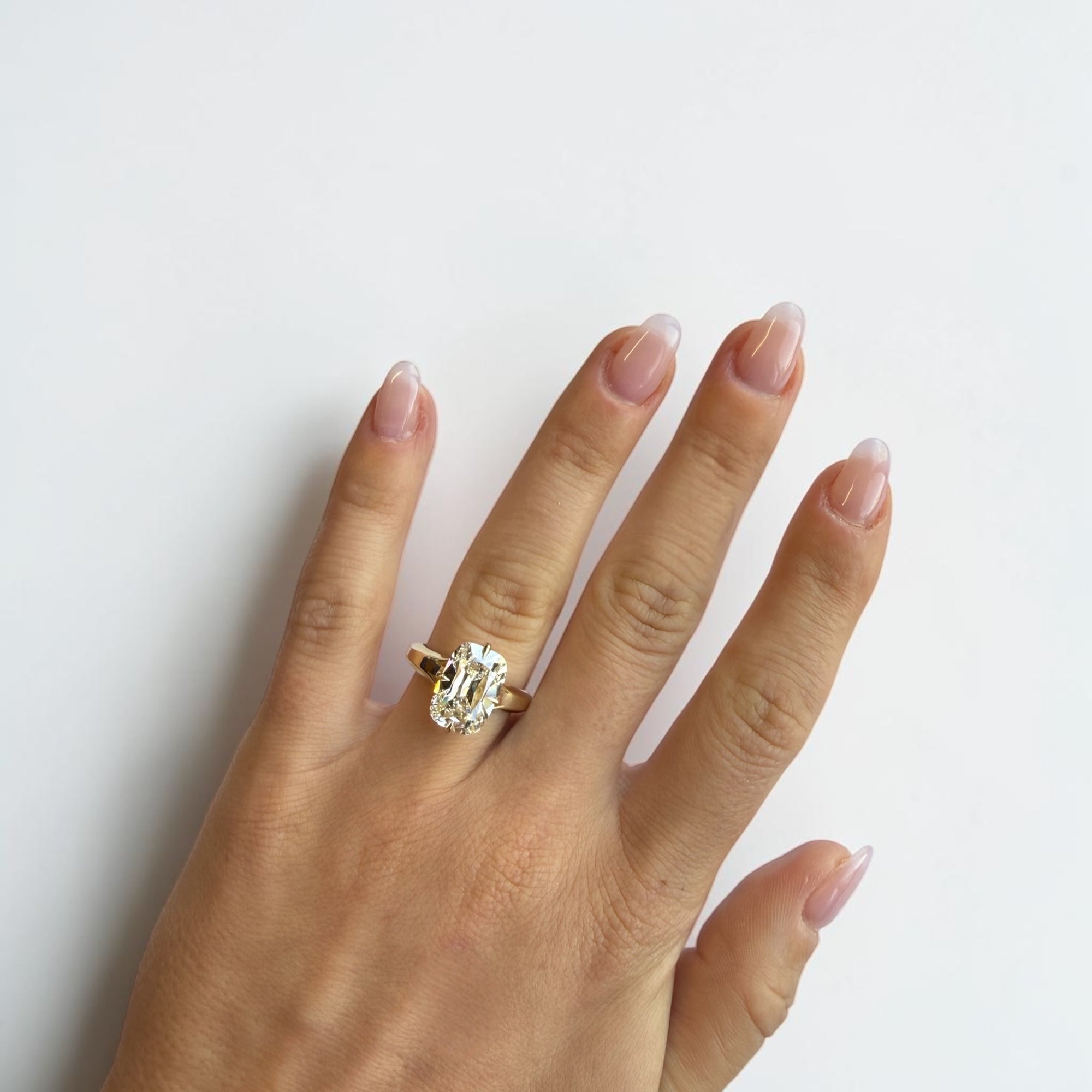 Close-up of 4.52ct elongated old mine cut lab diamond in compass claw yellow gold setting — Cherry Pick Diamonds Clayton Missouri