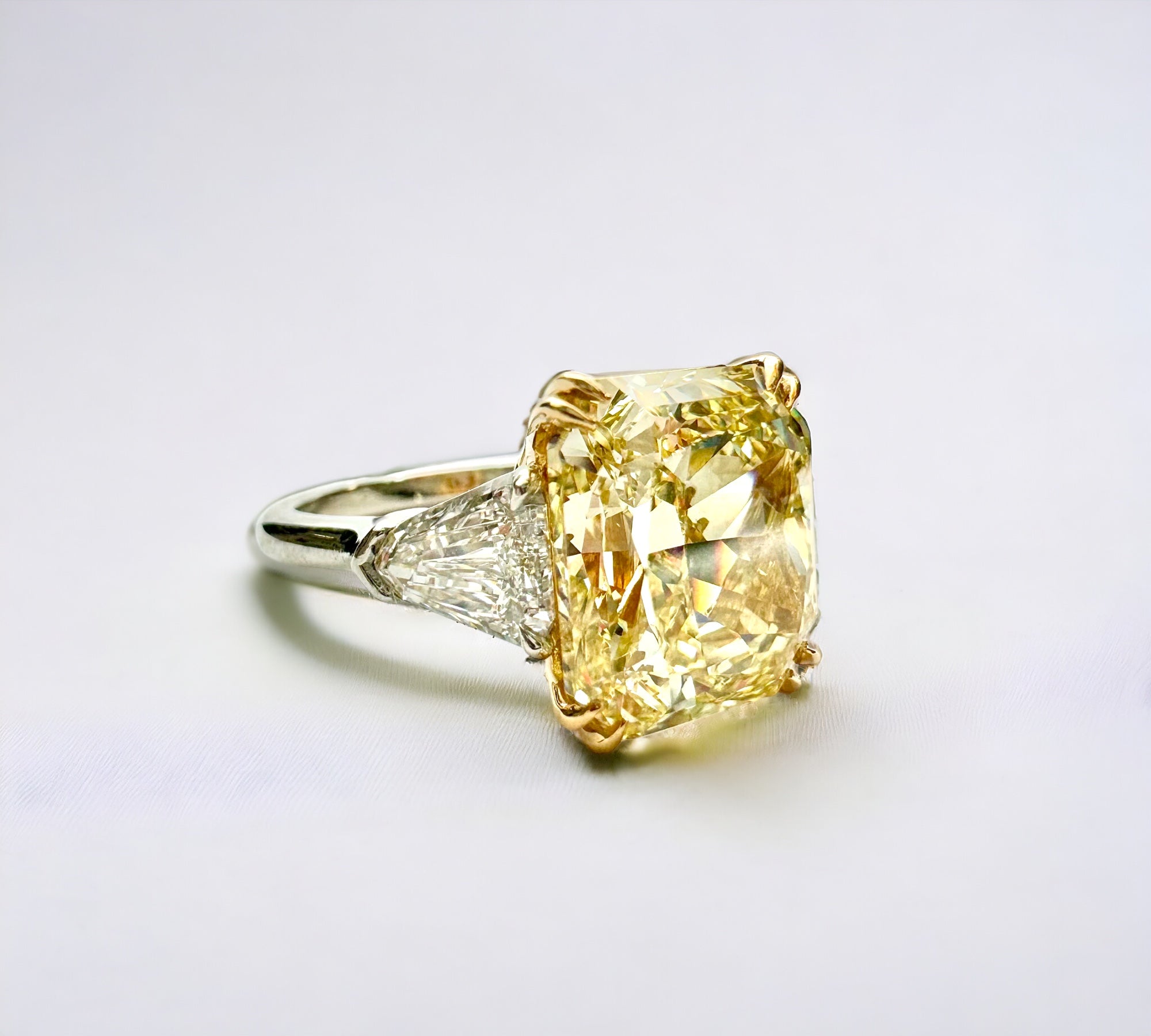 Trio Fancy Yellow platinum three stone ring side view with shield cut diamonds – Cherry Pick Diamonds St. Louis MO