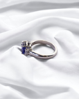 Trio Sapphire Ring platinum oval blue sapphire with diamond side stones – Cherry Pick Diamonds St. Louis MO