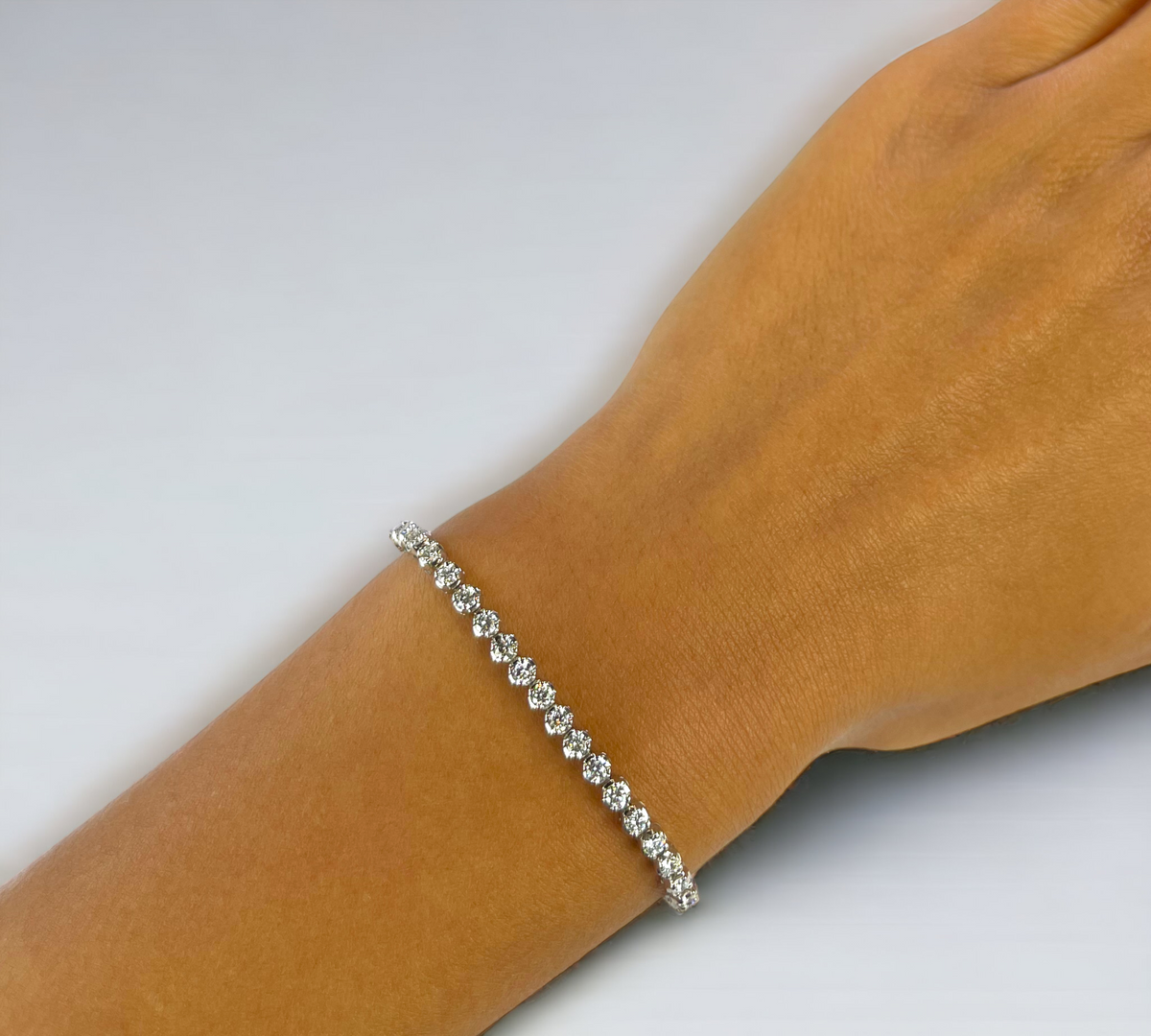 Firenze Buttercup 14K Yellow Gold Natural Diamond Tennis Bracelet on Wrist – Cherry Pick Diamonds St. Louis MO
