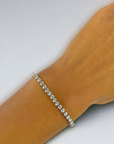 Firenze Buttercup 14K Yellow Gold Natural Diamond Tennis Bracelet on Wrist – Cherry Pick Diamonds St. Louis MO
