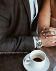 Milan white gold pavé halo engagement ring worn on hand with round brilliant diamond – Cherry Pick Diamonds St. Louis MO